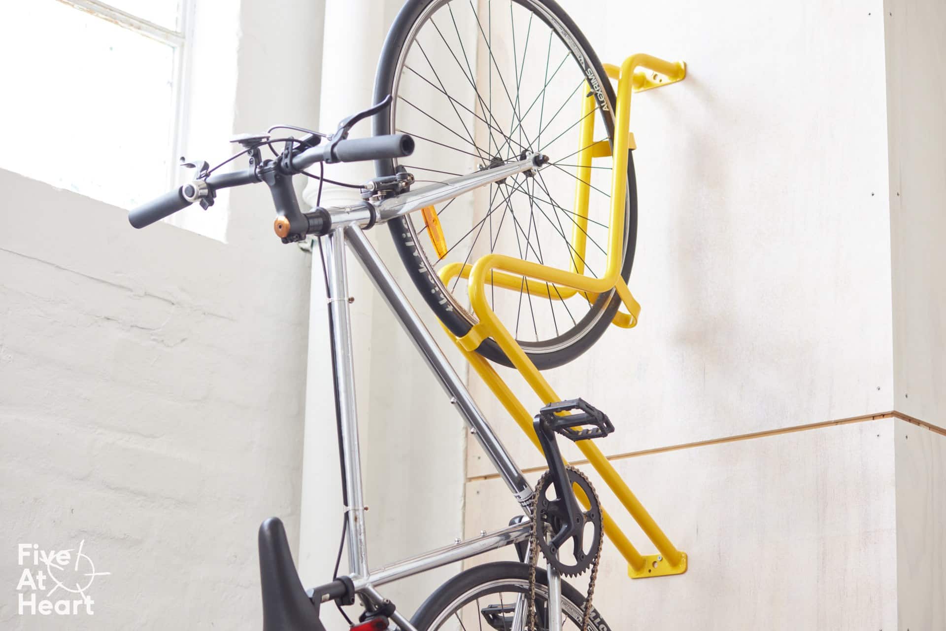 Pros And Cons of a Vertical Bike Rack